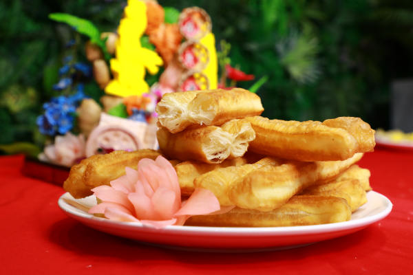 早點攤比較火的早餐油條